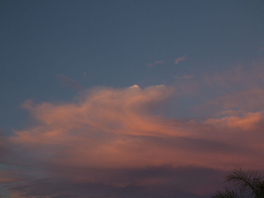 Clouds and strong, high winds